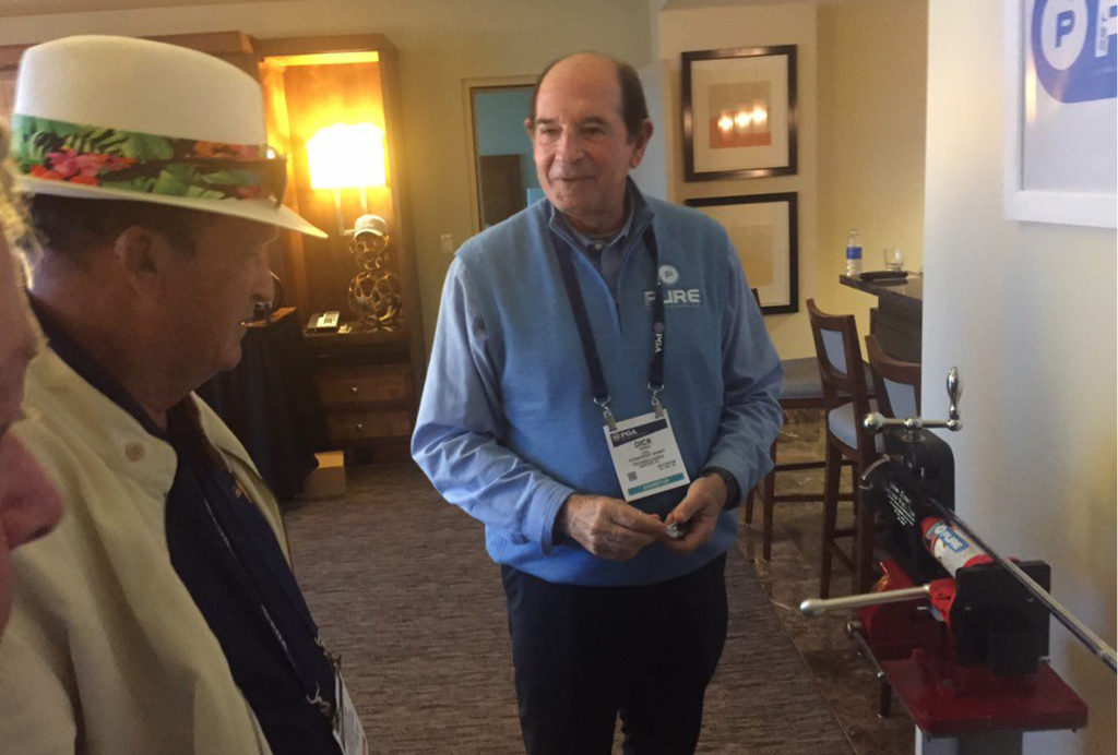 Dick Weiss at PGA Show showing off SST Pure